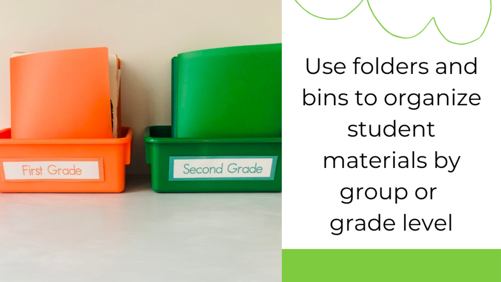 orange and green bins labeled first and second grade with folders