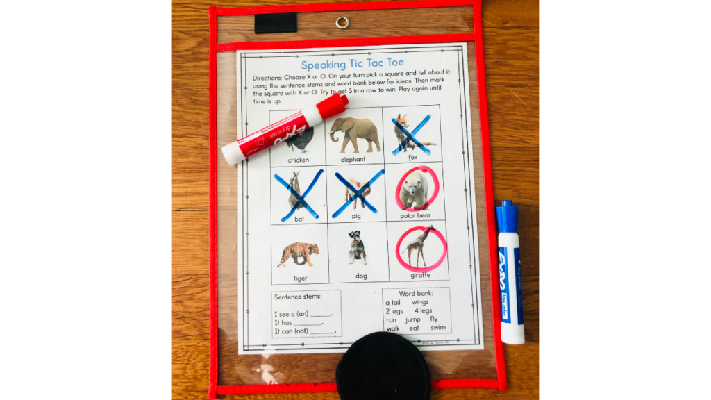 ESL speaking games example with a photo of a tic tac toe board with real photos of animals on it to supprt using visuals with ELLs