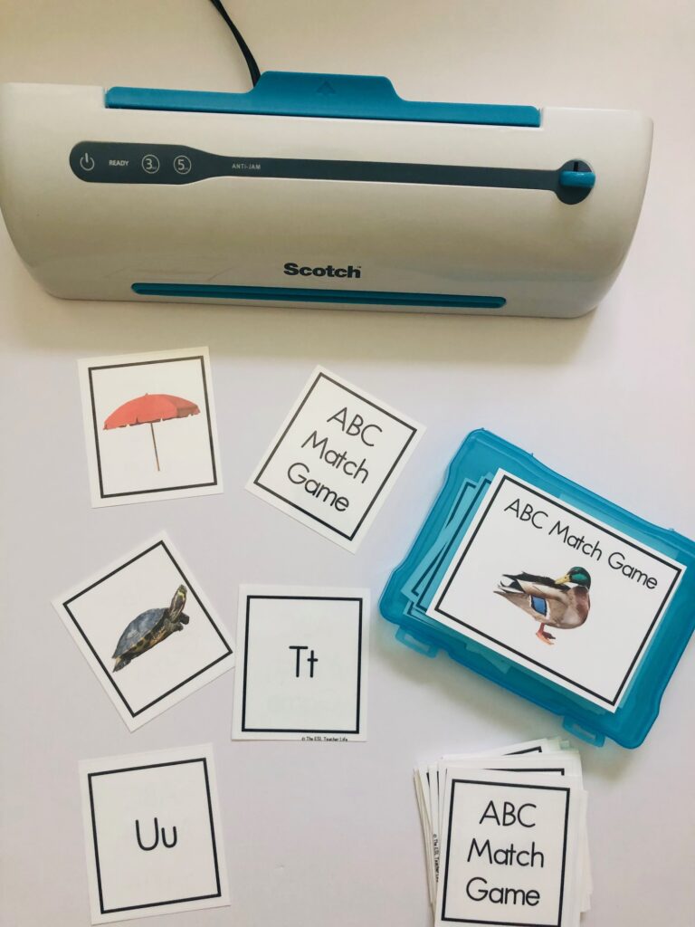 photo of a small laminator and laminated pictures