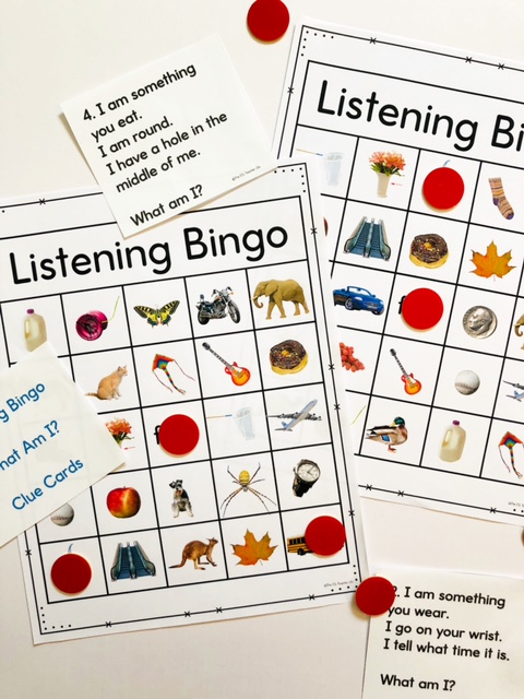 photo of 2 Bingo listening game boards with clues