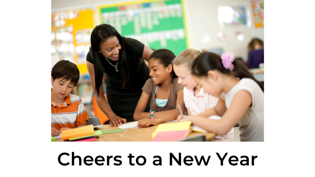 photo of teacher with students and caption "cheers to a new year"
