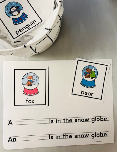 pictures of animals in snow globes and sentence frames